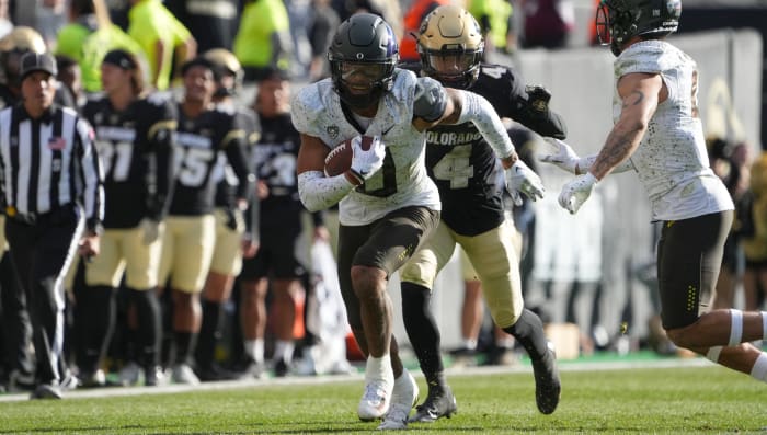 Christian Gonzalez returns an interception against the Colorado Buffaloes.